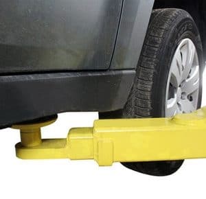 Vehicle wheel alignment lift for precise service and maintenance.