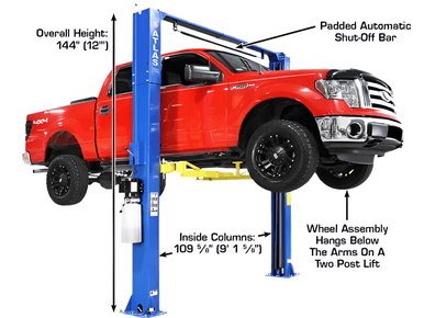 Heavy-duty red pickup truck on Triumph Lift Us vehicle lift system.